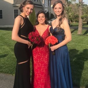 Worn once. Navy blue size 2 prom dress. Strapless with detailed jewel back.